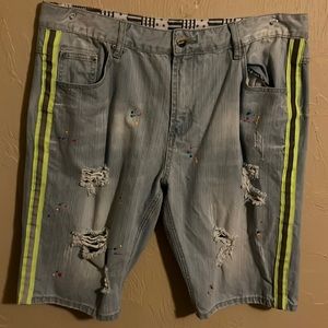 Jean shorts with neon green lining and multi color dots